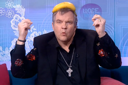 Meatloaf with a banana on his head