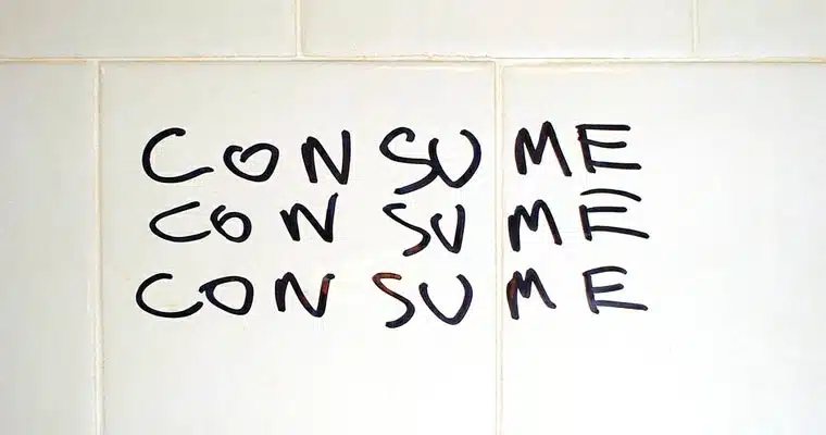 consume Consume graffiti on toilet wall
