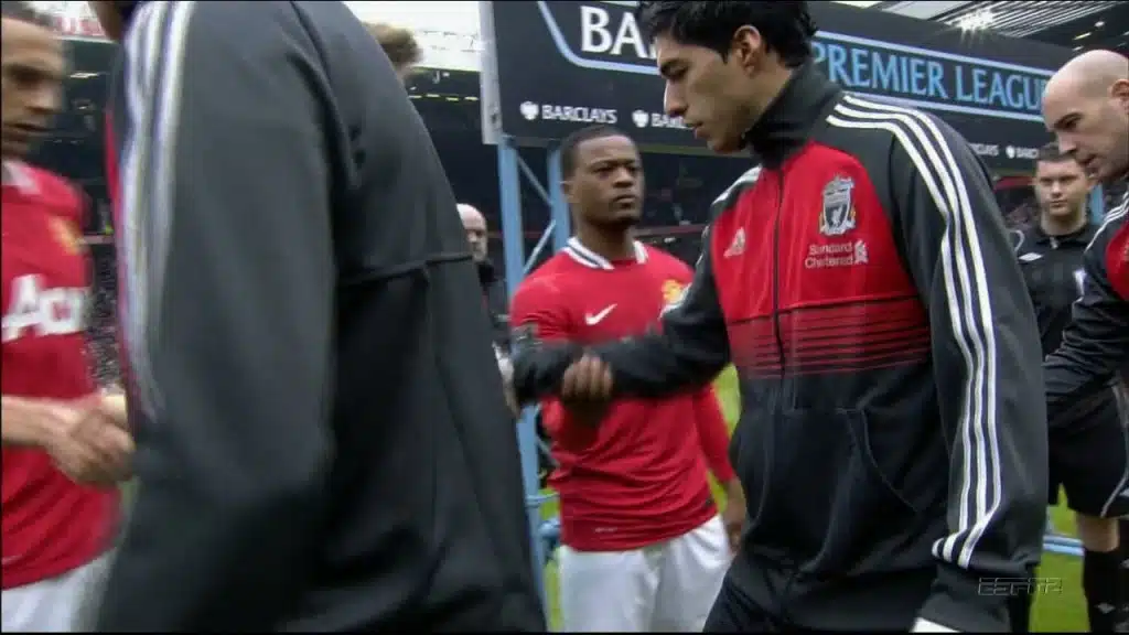 evra suarez evra suarez handshake