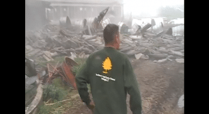 Dude Almost Dies Knocking Down Massive Silo With Sledgehammer