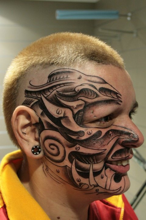 Rouslan Tomumaniantz - Tattoo Face Biomechanical