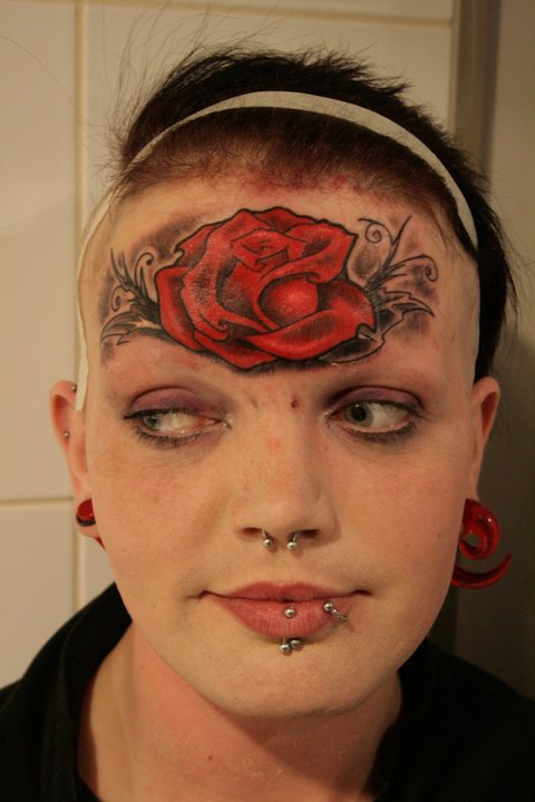 Rouslan Tomumaniantz - Tattoo Face Rose
