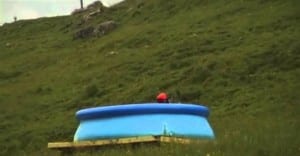 Man With Deathwish Builds Huge Waterslide And Ends Up In A Tiny Paddling Pool