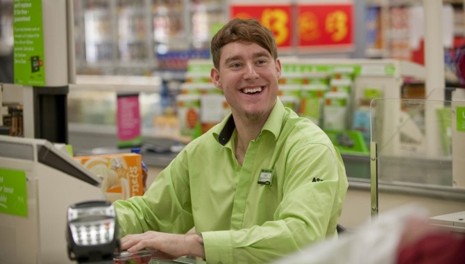 Man At Till In Supermarket