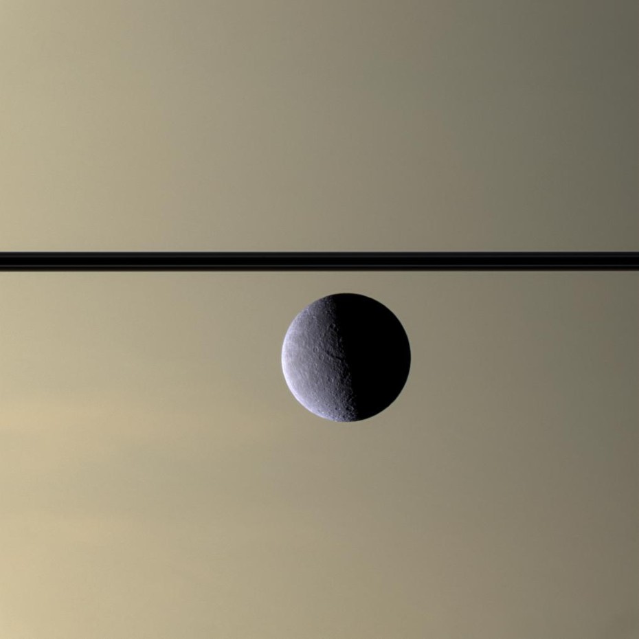 Rhea-in-front-of-Saturn-930x930