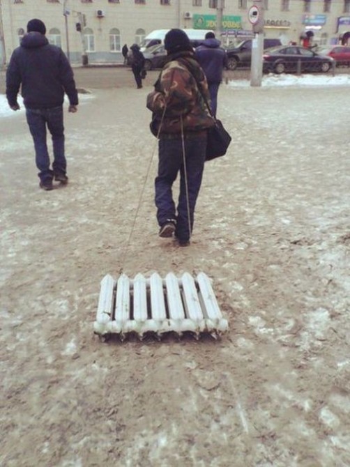 TheAwesome Photos From Russia With Love - bath radiator sledge