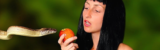 Eve tempted by snake with apple