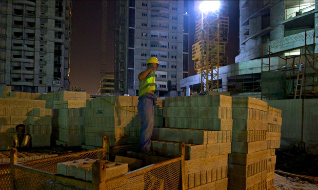 MDG : forced labour in Qatar : A North Korean worker on a construction site in Qatar