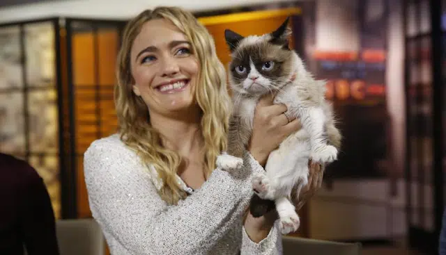 Grumpy Cat And Owner