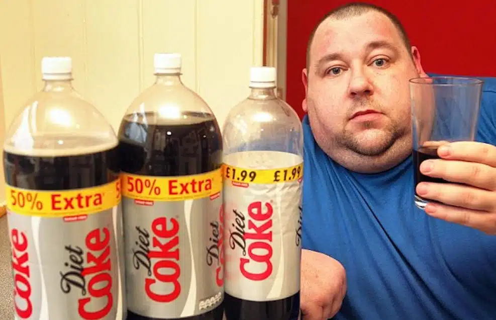 Fat man drinking Coke