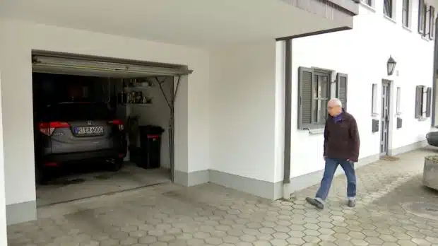 Pic shows: the garage.nnA German motorist has offered a 1,000 EUR reward to try and find lovers who damaged the bodywork on his brand-new car and stained it with semen in a steamy sex session.nnErik Roschetsky was furious when he was left with a 3,000 EUR (2,322 GBP) repair bill after a randy couple had sex on his car - and also left behind sperm stains.nnHe said: "There were footprints on the bodywork, there was bodily fluids running down to the bottom of the car, and it was only two days old."nnHe had even taken the trouble to put the car in a garage to keep it off the streets during the Carnival festivities in Wörth an der Donau, a town in the district of Regensburg in Bavaria in Southern Germany, but drunken revellers but discovered he had not locked the door, and sneaked inside for a naughty number.nnWhen Erik returned the next day to use the vehicle, he was shocked to discover a huge dent in the bodywork. One of the wing mirrors had also been ripped off, and when he noticed suspicious stains on the bodywork he called police.nnDetectives then confirmed that the stains were semen, hardening the suspicion that the dent was caused by somebody using the car to have sex. Police believe one of the pair was probably holding onto the wing mirror when it snapped off.nnPolice confirmed that they have secured a DNA sample from the vehicle and are looking for the revellers, who they believe probably went into the underground car park looking for a quiet place to have sex.nnPolice spokesman Josef Schweiger said they were investigating on charges of trespassing and criminal damage.nnOutraged local Anna Stadler said: "I am shocked that this can happen during a festival which is supposed to be a holy time, you'd think they could find somewhere more appropriate than sneaking into a garage."nn(ends)nn n