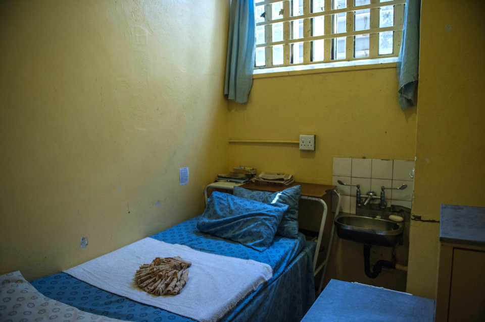 A picture taken on December 1, 2015 shows the prison cell where Oscar Pistorius stayed, at the Kgosi Mampuru II Prison on December 1, 2015 in Pretoria, South Africa. South Africa's Supreme Court of Appeal will announce Thursday its verdict on a bid by state prosecutors to have Oscar Pistorius convicted of murder and sent back to jail for shooting dead his girlfriend. The star Paralympic sprinter was found guilty last year of the lesser crime of culpable homicide -- the equivalent to manslaughter -- for killing Reeva Steenkamp in the early hours of Valentine's Day, 2013. Pistorius, who said he mistook Steenkamp for an intruder when he opened fire with his pistol, was released from prison on parole in October after serving one year of his five-year sentence. / AFP / MUJAHID SAFODIEN (Photo credit should read MUJAHID SAFODIEN/AFP/Getty Images)