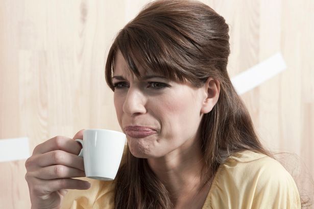 disgusted-woman-with-cup