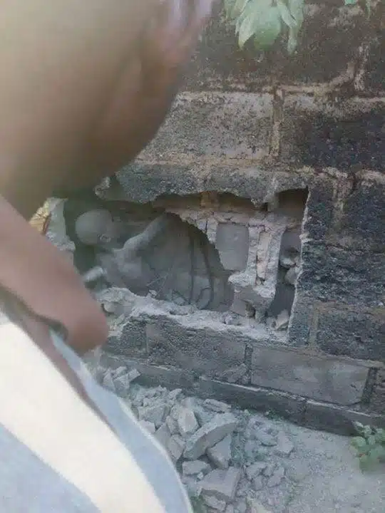 boy-stuck-wall