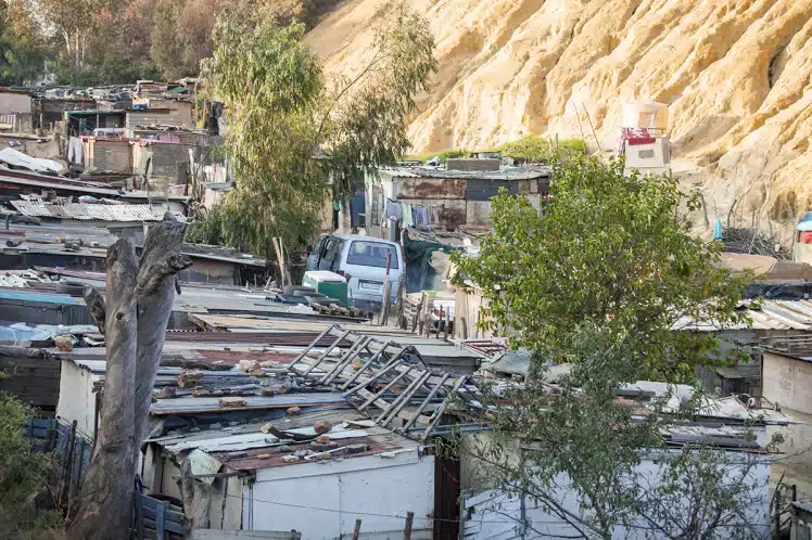 Informal settlement next to mine dump, East Rand, Johannesburg, Gauteng Province, South Africa