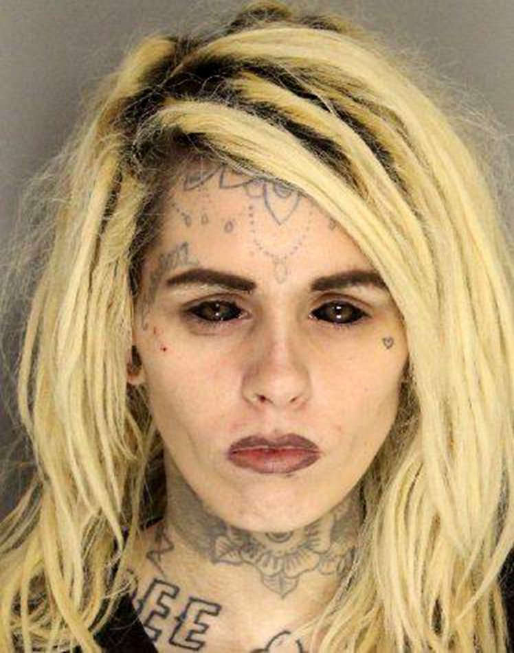 Heavily tattooed South Carolina woman poses for striking mugshot.