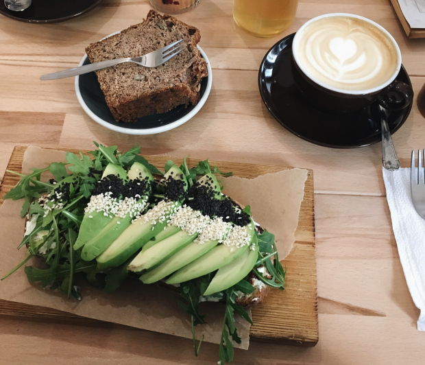 Avocado slice with cake and coffee