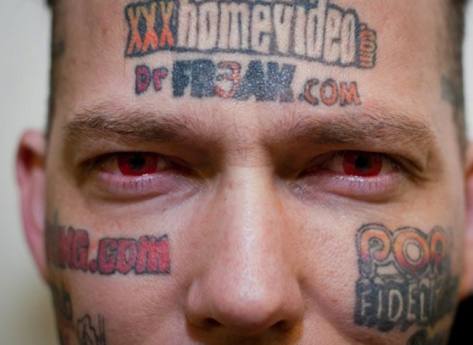 Man Who Turned Face Into Tattooed Advertising Billbo