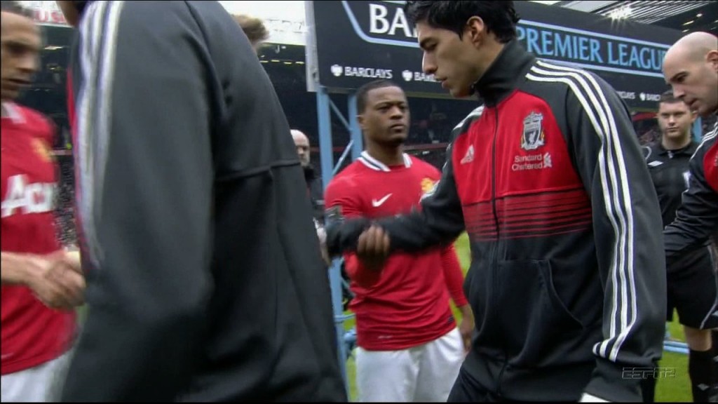 evra suarez handshake