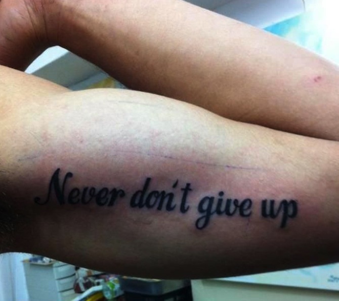 [Image: Bad-Tattoos-Dont-Never-Give-Up.jpg]