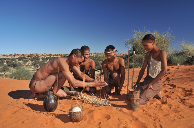 San Bushmen making a fire