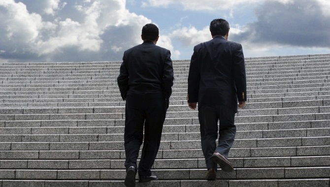 Two Men Walking