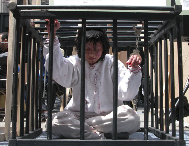 China Prison - Torture - Woman In Cage