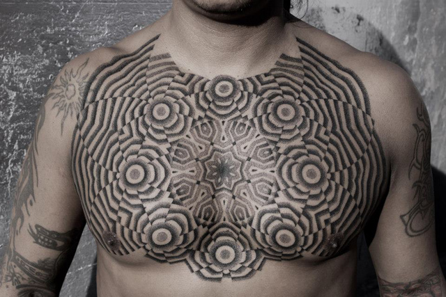 geometric chest tattoo