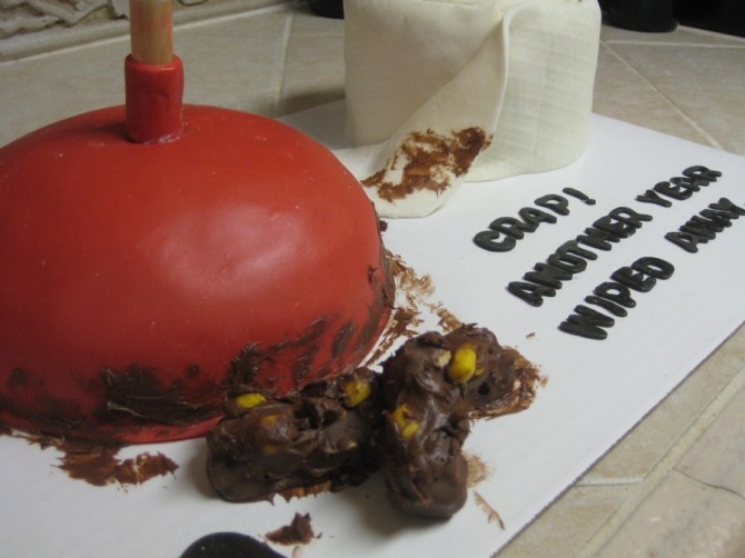 plunger and poo cake