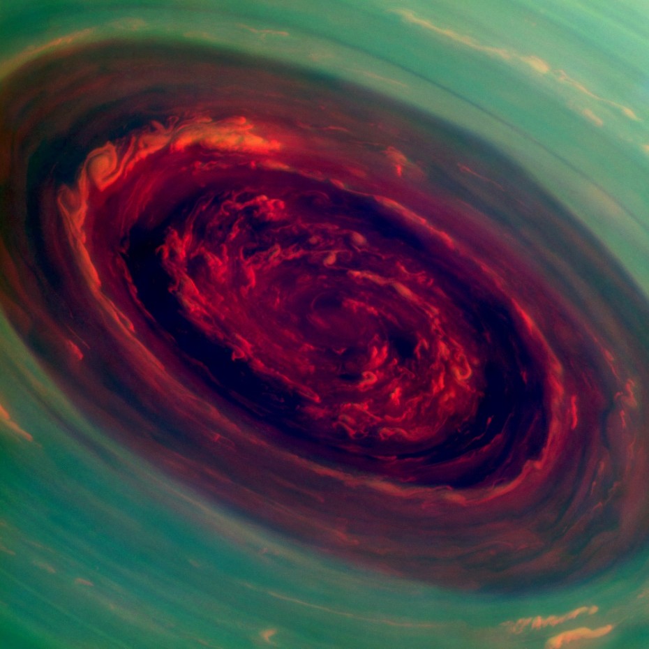 The-Rose-on-Saturn-is-a-massive-hurricane-inside-the-hexagon-cloud-formation-at-the-north-pole.-Its-eye-is-1250-miles-wide-20x-larger-than-Earth-hurricanes-and-wind-speeds-reach-330-mph-930x930