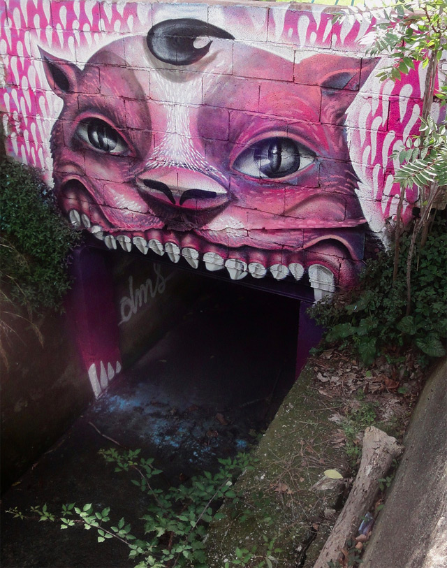 cat demon tunnel street art