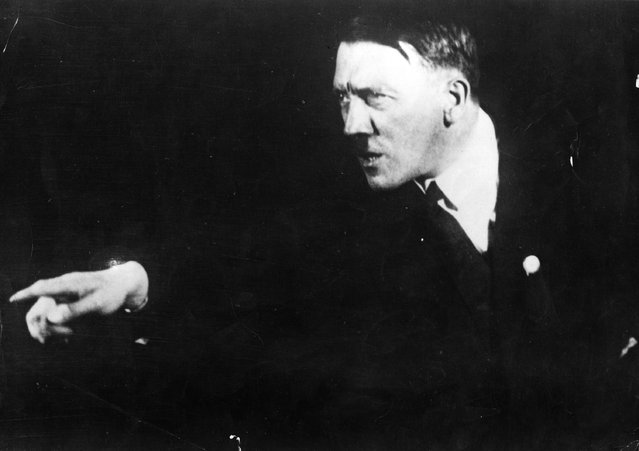 Adolf+Hitler+Posing+to+a+Recording+of+His+Own+Speeches+1925+1