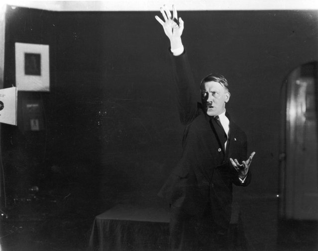 Adolf+Hitler+Posing+to+a+Recording+of+His+Own+Speeches+1925+11