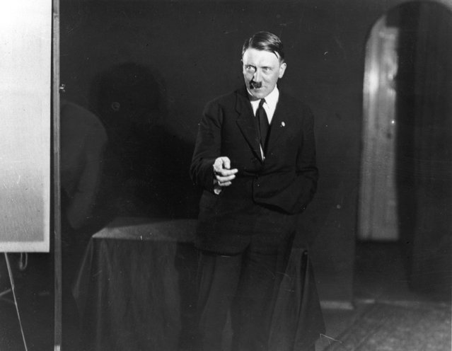 Adolf+Hitler+Posing+to+a+Recording+of+His+Own+Speeches+1925+12