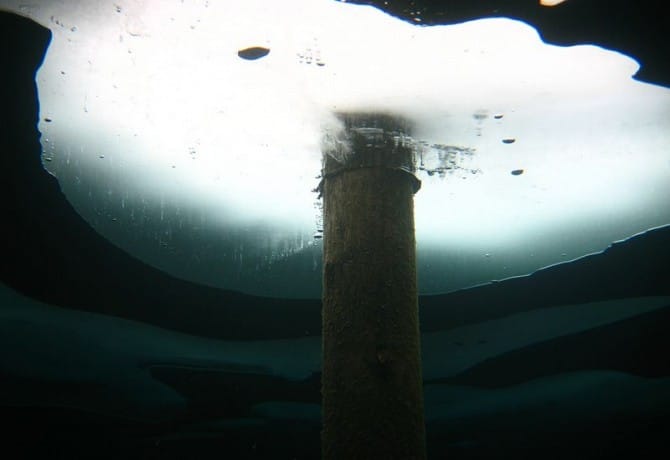 Sunken Forest in Kazakhstan - Lake Kaindy in winter under ice 2