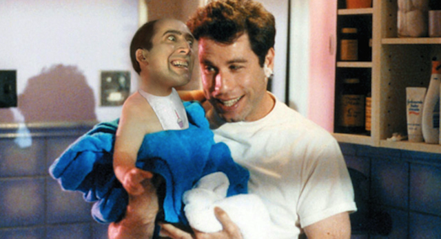 People Holding Baby Nic Cage