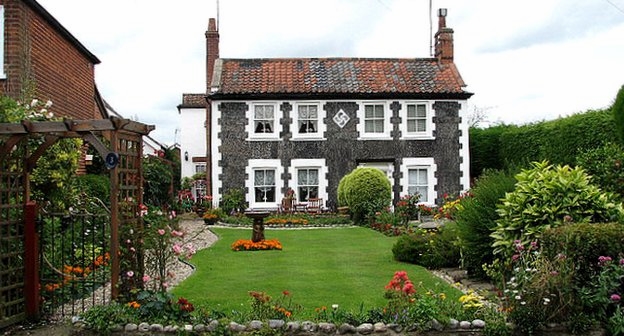 Swastika Architecture - pebble flint cottages near Aylsham in Norfolk