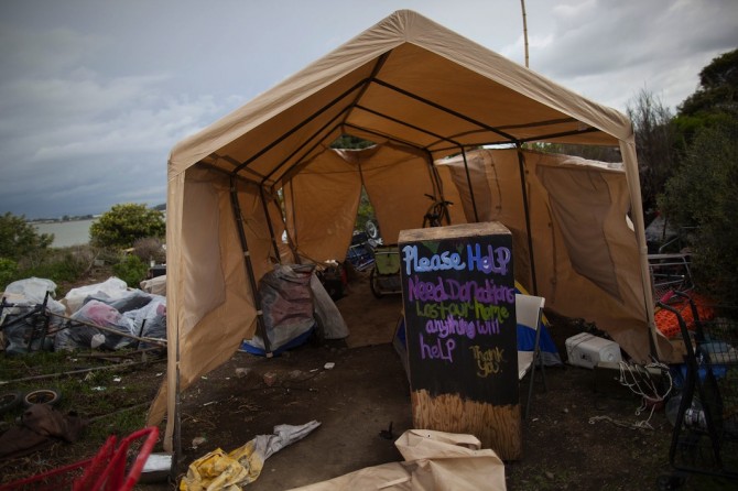 Since the destruction of his home, Anderson now lives in this nearby tent.