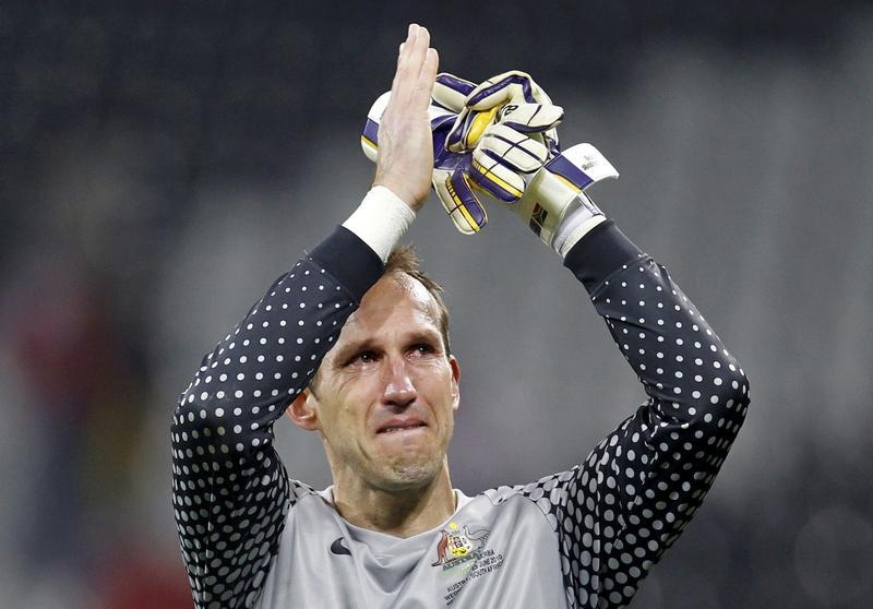 Australia's goalkeeper Schwarzer cries at the end of a 2010 World Cup Group D soccer match against Serbia at Mbombela stadium in Nelspruit