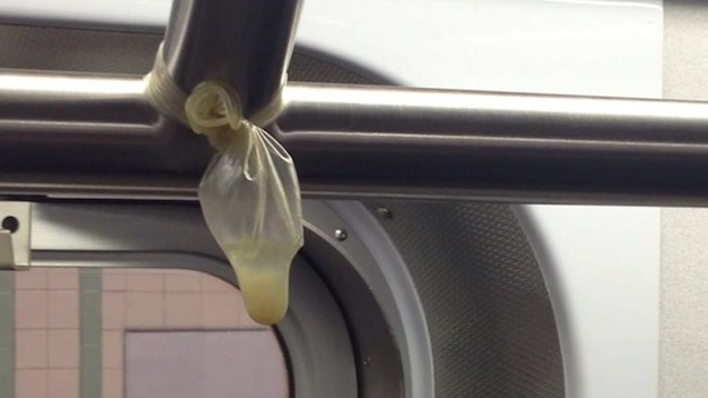 Condom Tied To Handrail