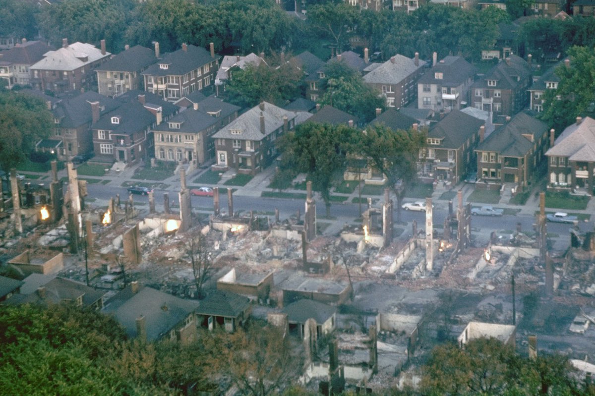 Smoldering ruins of middle class black neighborhoo