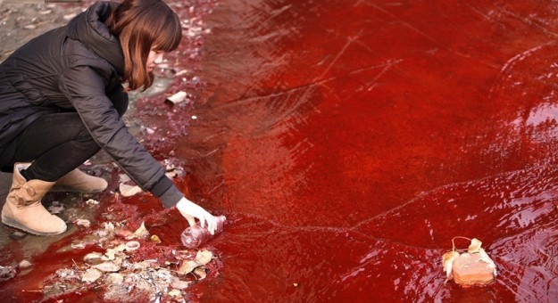 China Pollution Images - red water