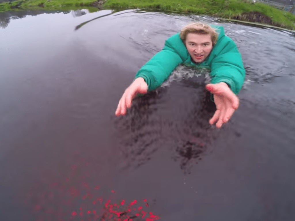 WATCH: Man Jumps Into Lake To Save Brand New Drone