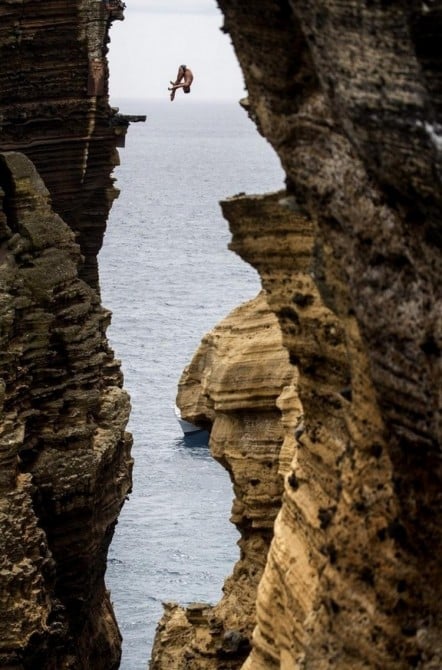 Acrophobia - Blake Aldridge dives 29 metres from the rock monolith during the Red Bull Cliff Diving World Series in Portugal