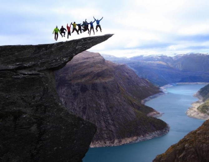 Acrophobia - Jumping on the Trolltunga rock in Norway