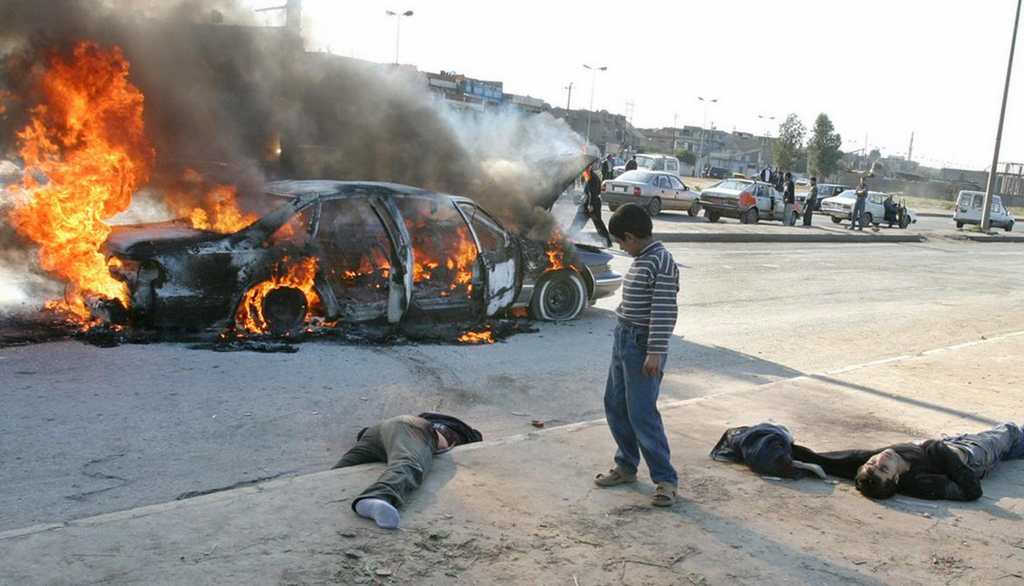 Iraq War In Pictures - Insurgents Car Attack Bodies And Boy
