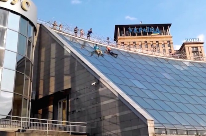 Drunk Russians Slide Down Shopping Centre Roof