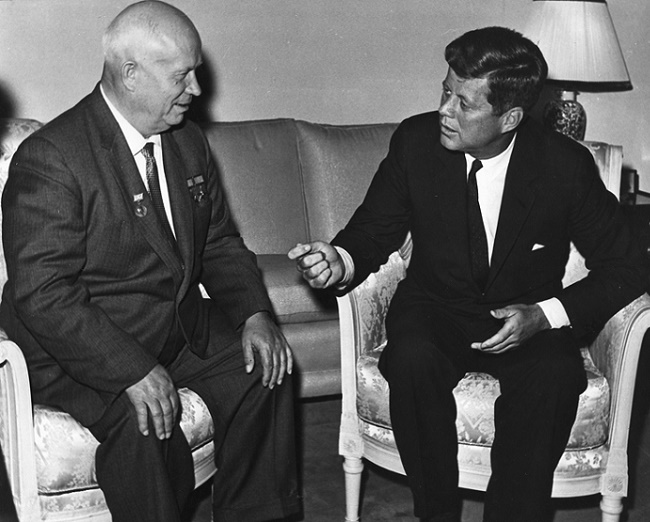 John F. Kennedy and Nikita Khrushchev negotiating.