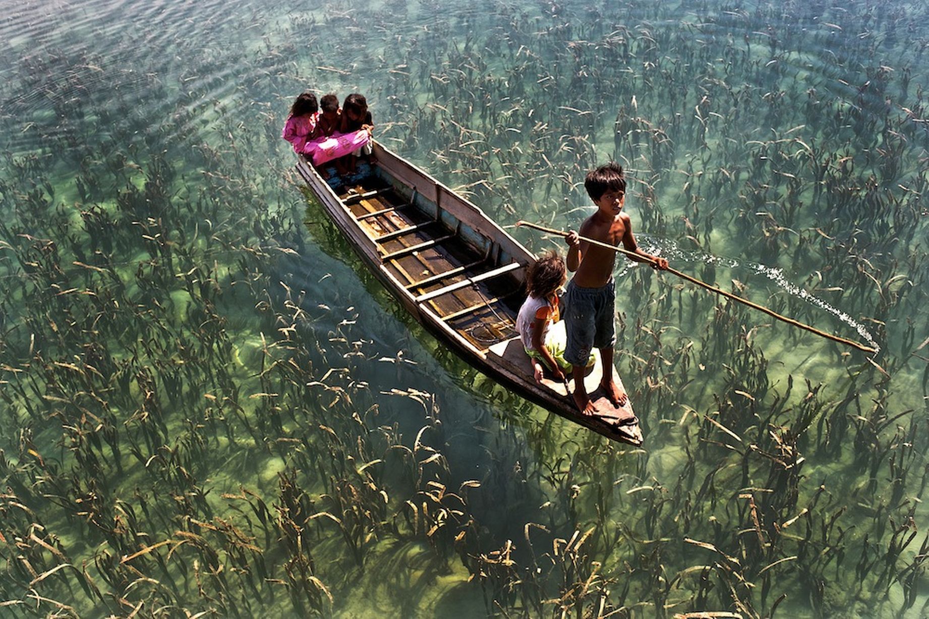 Bajau people of Malaysia - Bajau Children Boat#