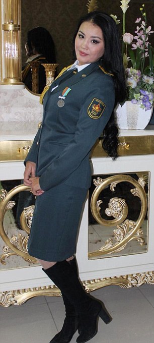 Pic shows: Elvira Ayazbaeva. Military officials in Borat’s homeland Kazakhstan have introduced a Miss Army competition to encourage more people to sign up for duty. The Kazakhstani Ministry of Defence has chosen 123 of its prettiest female soldiers and posted their photos online where viewers can vote for their faves. The photos show the women posing in three set poses: one with military uniform, one with weapons and one in civilian clothes - and they have already been seen by over 30,000. A spokesman for the MOD said: "Voting began this week and the competition is open until the 10th of May. "We’ve been flooded with views and the clear favourite at the moment is Sergeant Aigerin Karakuchukova who is in the lead with over 1,100 votes. "There is still a long way to go though and anyone could win." The spokesman revealed that the competition was also open to voters not only from Kazakhstan but also neighbouring countries Krygystan, Azerbaijan and Russia. Voter Nicephorus Bocharov, 34, said: "There are certainly some fine looking women in there, although I’m not sure it would make me want to sign up and fight. "Still, am very happy to look at them and imagine what it would be like to take them on in a full on assault." Another fan, Emil Efremov, 32, said: "I think this is a very good idea. "After the world was introduced to Borat people have the impression that everyone hear lives on a farm and sleeps with donkeys. "These photos show that Kazakh women are as beautiful as any others. "I have voted for all of them." The MOD spokesman said: "The winner will receive a cash prize and have the knowledge of knowing she is the most beautiful woman soldier in Kazakhstan. "And hopefully, she'll have the pleasure of knowing she attracted hundreds of young men to join up." (ends)       